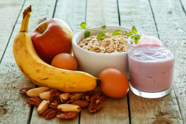 Colourful balanced meal ingredients arranged on a table